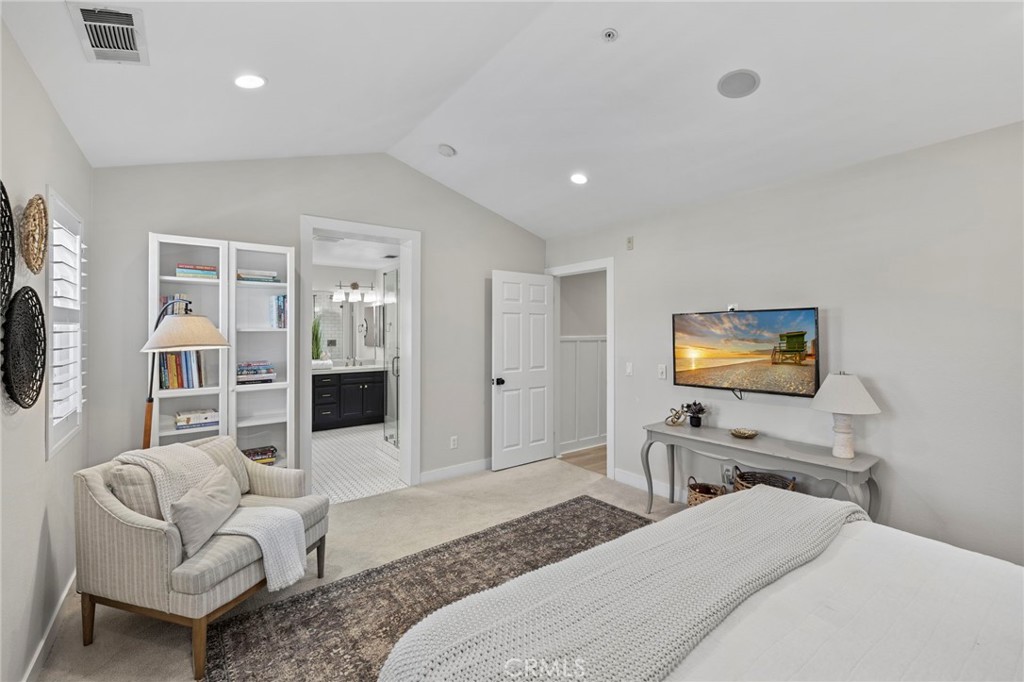 36 Tuberose Street Ladera Ranch, CA 92694 - Photo 26 of 39 a bedroom with furniture and a flat screen tv