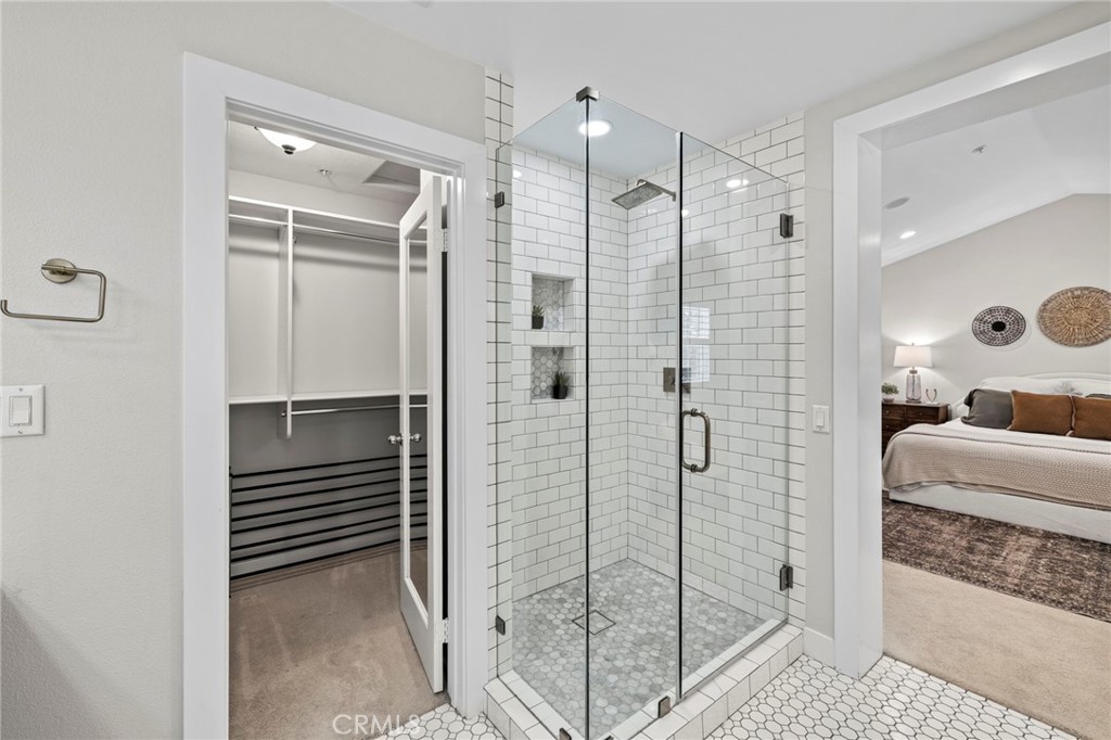 36 Tuberose Street Ladera Ranch, CA 92694 - Photo 29 of 39 a bathroom with a shower and a sink