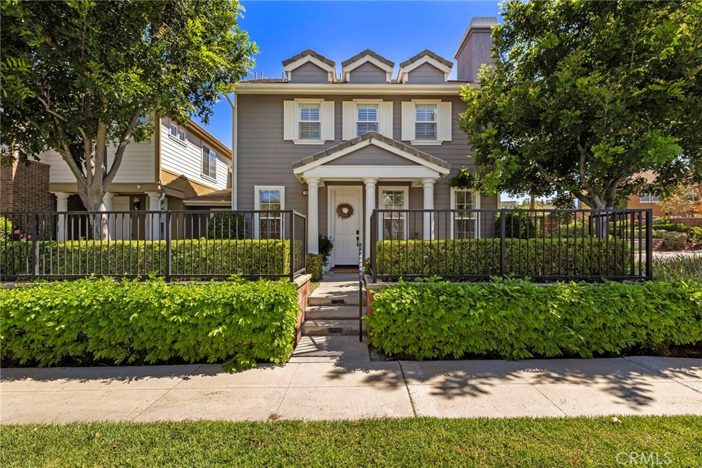 36 Tuberose Street Ladera Ranch, CA 92694 - Photo 38 of 39 a front view of a house with a garden