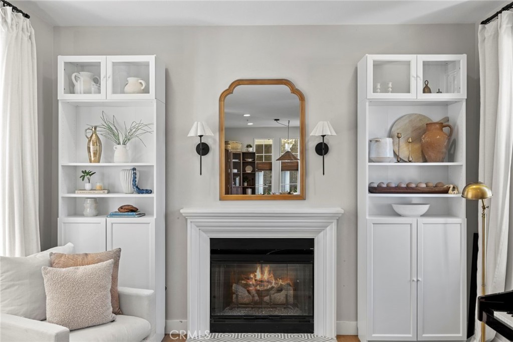 36 Tuberose Street Ladera Ranch, CA 92694 - Photo 9 of 39 a living room with furniture and a fireplace