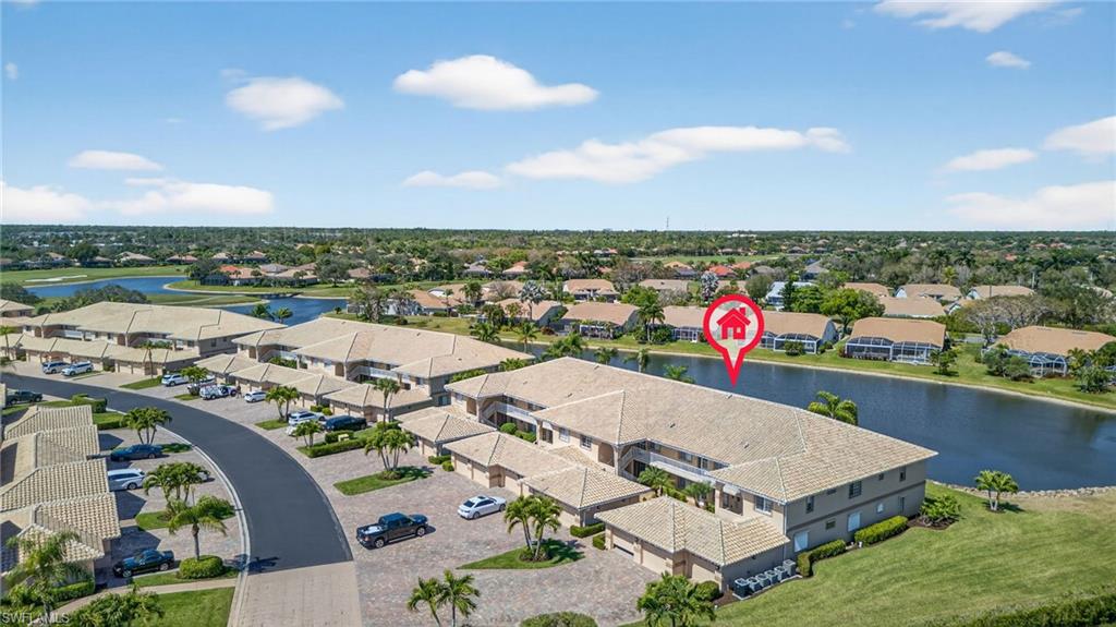 9009 Michael Circle, Unit 4 Naples, FL 34113 - Photo 30 of 34 an aerial view of a house