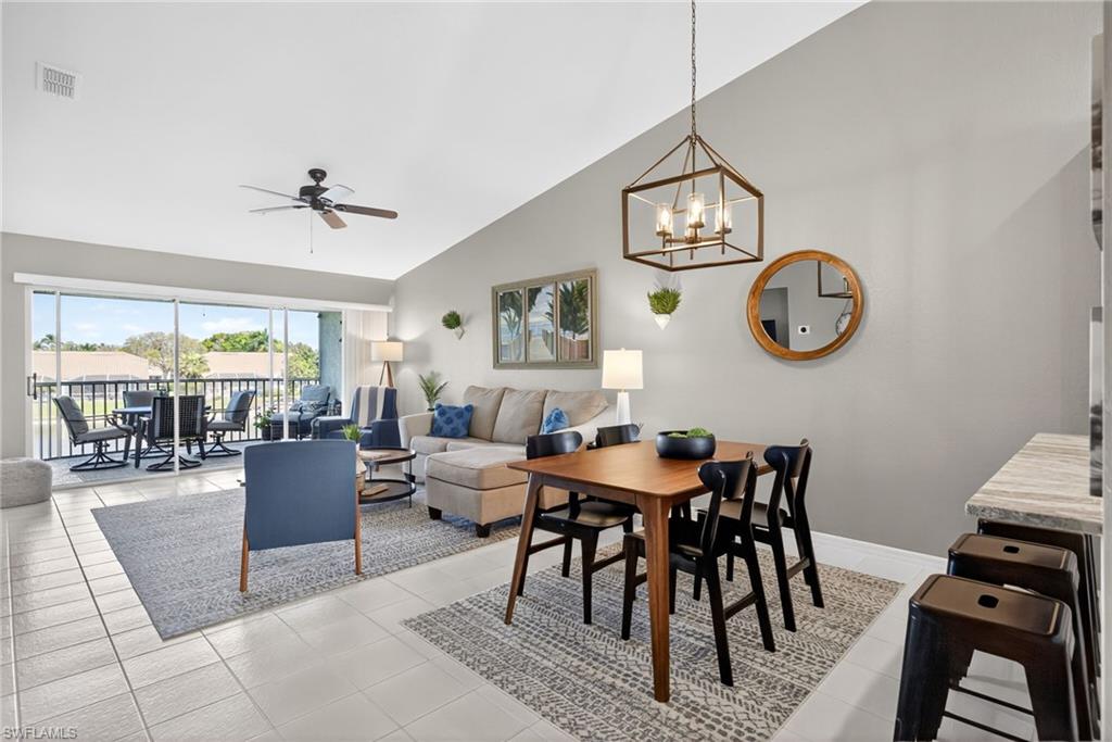 9009 Michael Circle, Unit 4 Naples, FL 34113 - Photo 6 of 34 a view of a livingroom and dining room