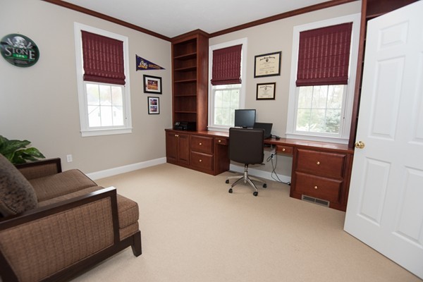 85 Johnson Drive Holliston, MA 01746 - Photo 15 of 30 a living room with furniture and a window