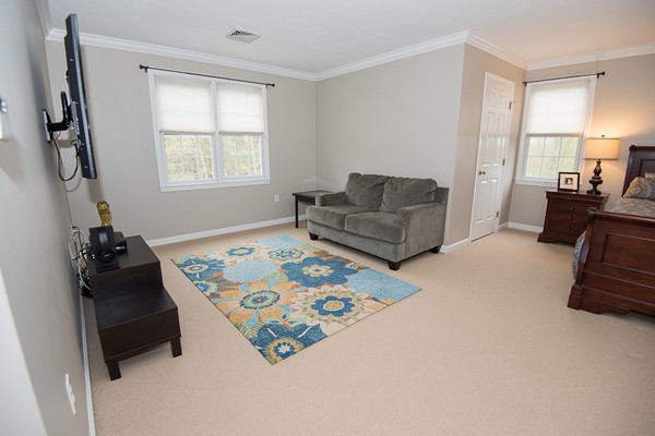 85 Johnson Drive Holliston, MA 01746 - Photo 22 of 30 a living room with furniture and a window