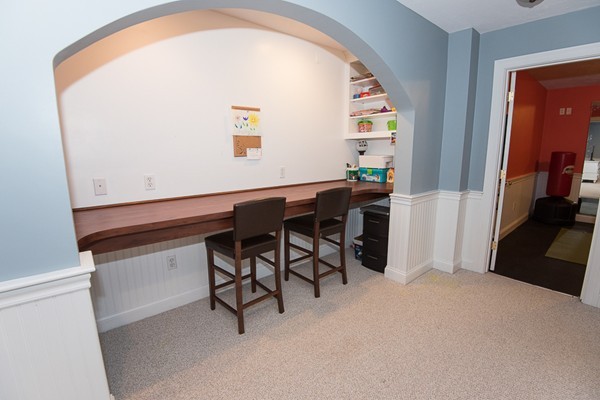85 Johnson Drive Holliston, MA 01746 - Photo 27 of 30 a view of a workspace room with wooden floor and windows