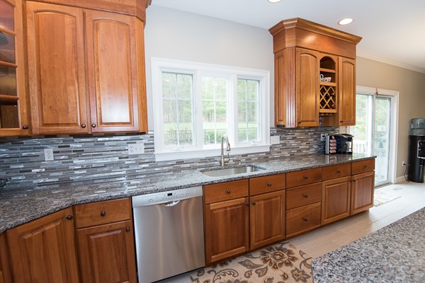 85 Johnson Drive Holliston, MA 01746 - Photo 10 of 30 a kitchen that has a sink and a window
