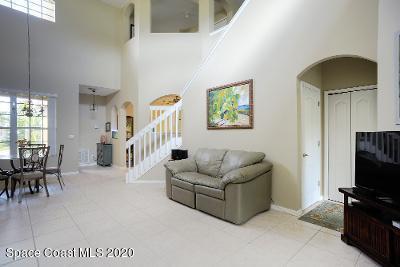 304 Intrepid Way Melbourne, FL 32903 - Photo 12 of 37 a living room with furniture and a flat screen tv