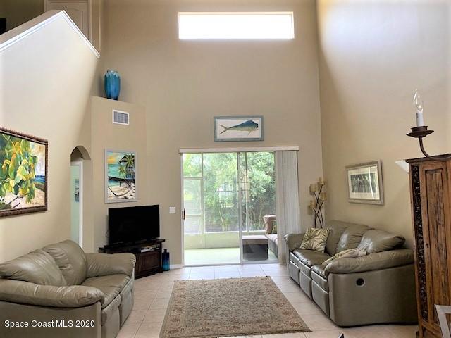 304 Intrepid Way Melbourne, FL 32903 - Photo 13 of 37 a living room with furniture and a flat screen tv