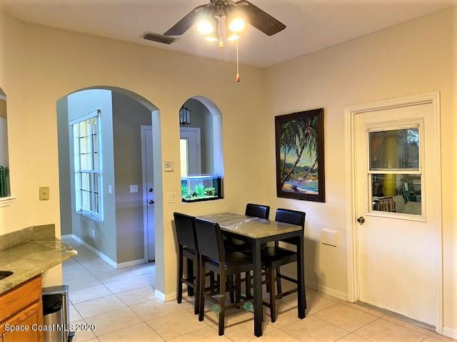 304 Intrepid Way Melbourne, FL 32903 - Photo 5 of 37 a view of a dining room with furniture