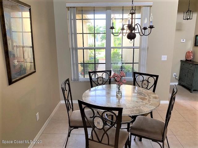 304 Intrepid Way Melbourne, FL 32903 - Photo 6 of 37 a view of a dining room with furniture and window