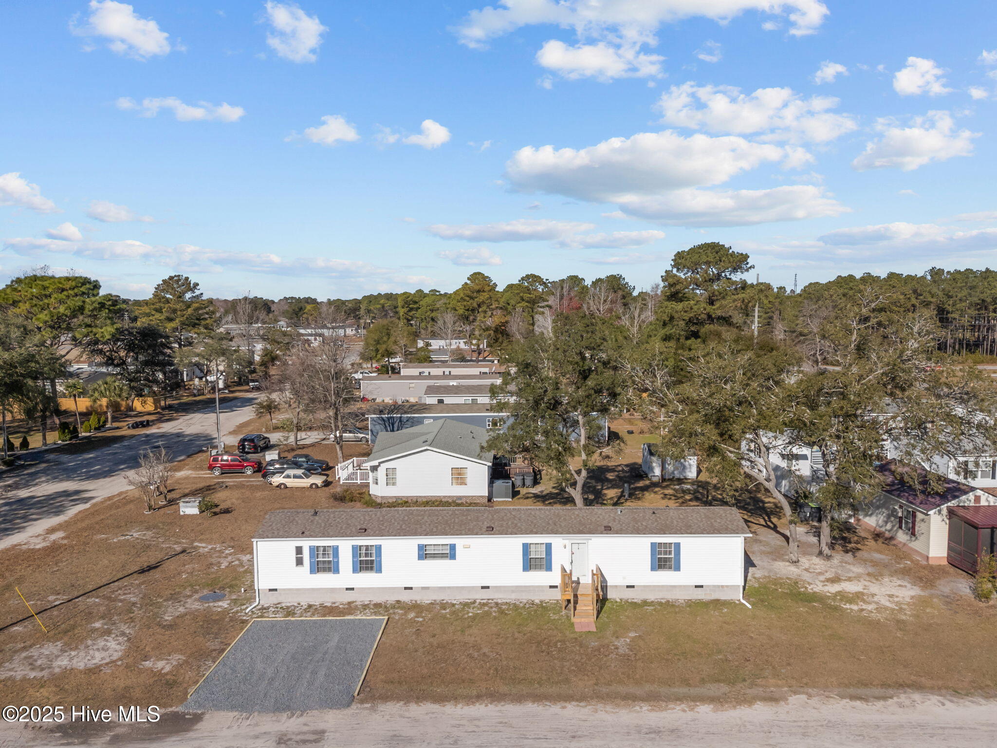 955 Pineclair Drive Southwest Calabash, NC 28467 - Photo 2 of 44 4-web-or-mls-DJI_20251211112934_0415_D