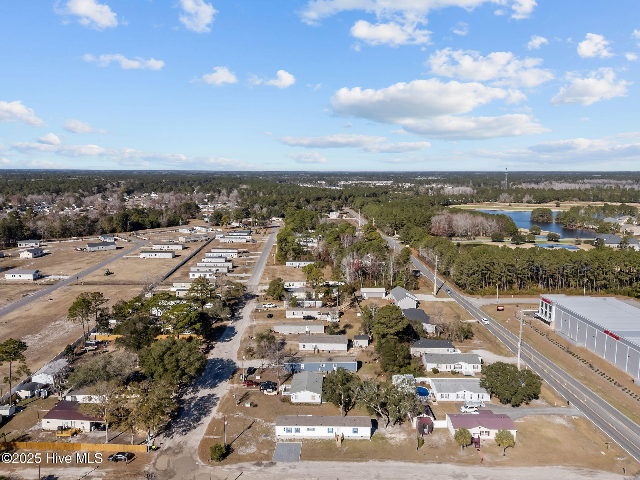 955 Pineclair Drive Southwest Calabash, NC 28467 - Photo 3 of 44 7-web-or-mls-DJI_20251211113450_0419_D