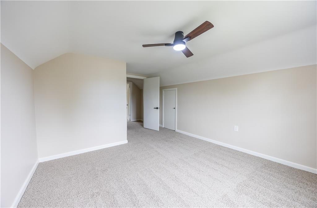 552 Stephens Street Ambridge, PA 15003 - Photo 16 of 21 a view of an empty room with a ceiling fan