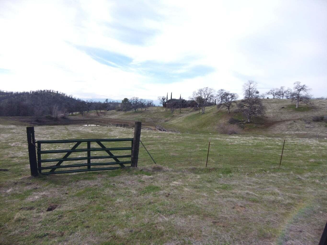 210-211 Perla Road Igo, CA 96047 - Photo 24 of 25 a view of a bench in front of a lake