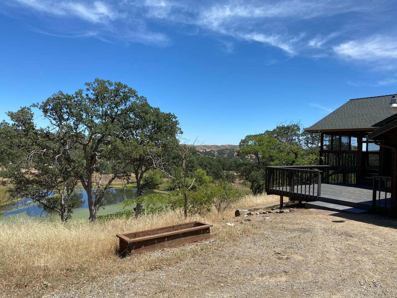 210-211 Perla Road Igo, CA 96047 - Photo 25 of 25 a view of a lake with a yard
