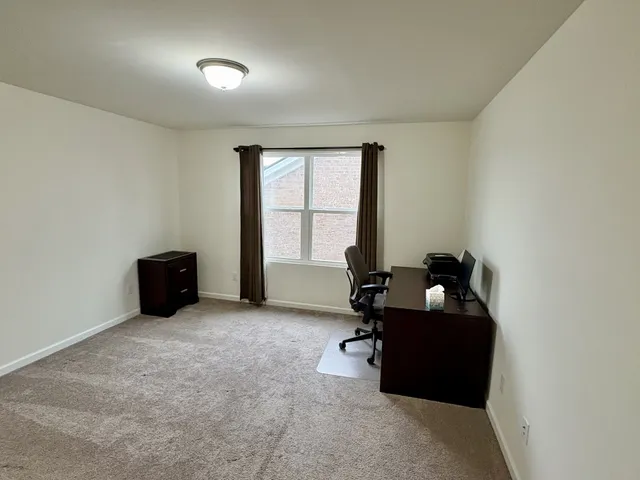 a room with furniture and a window