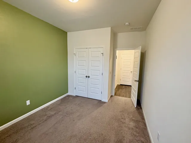 an empty room with closet