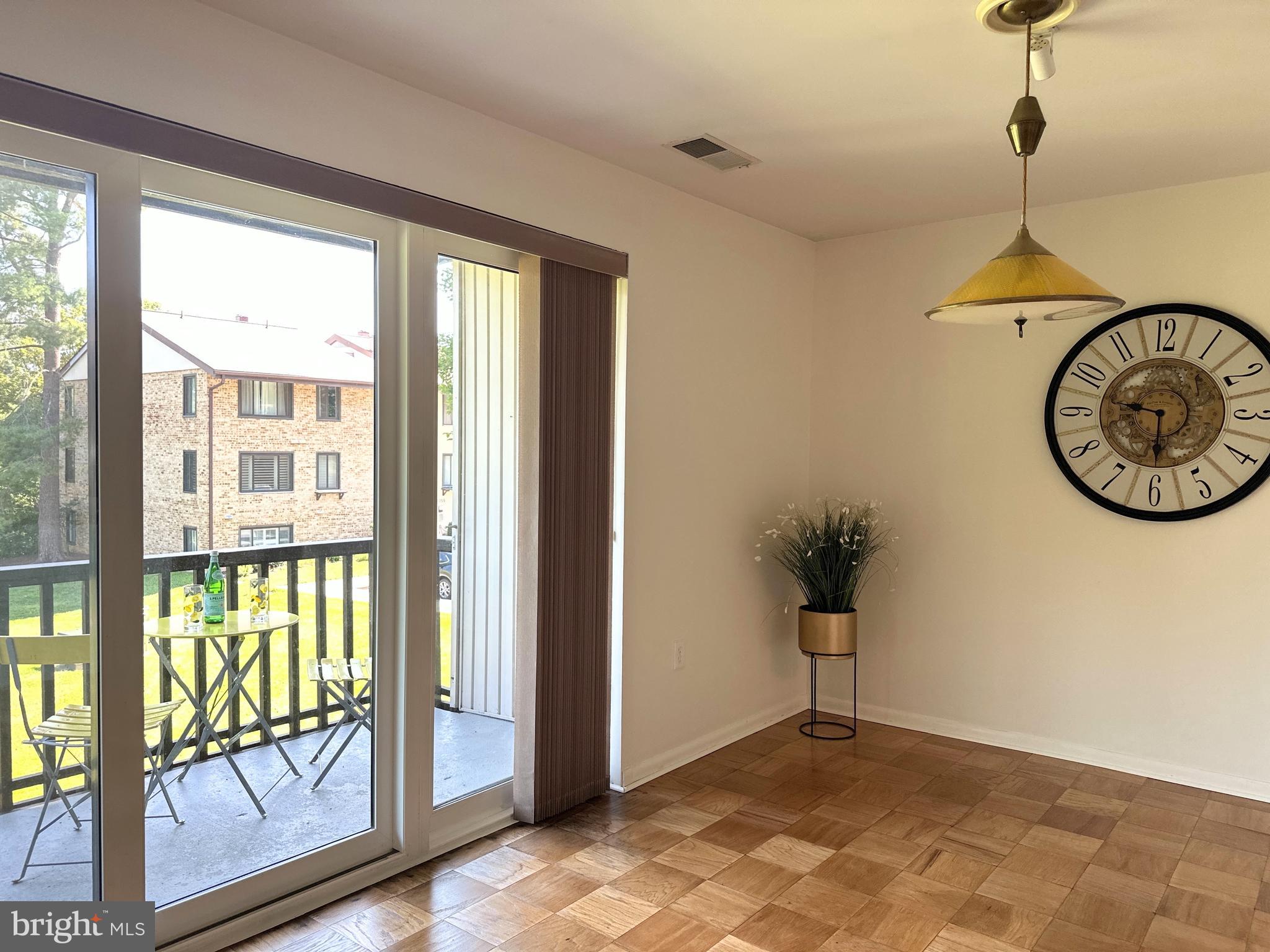 10053 Windstream Drive, Unit 3 Columbia, MD 21044 - Photo 14 of 57 a view of a hallway with windows