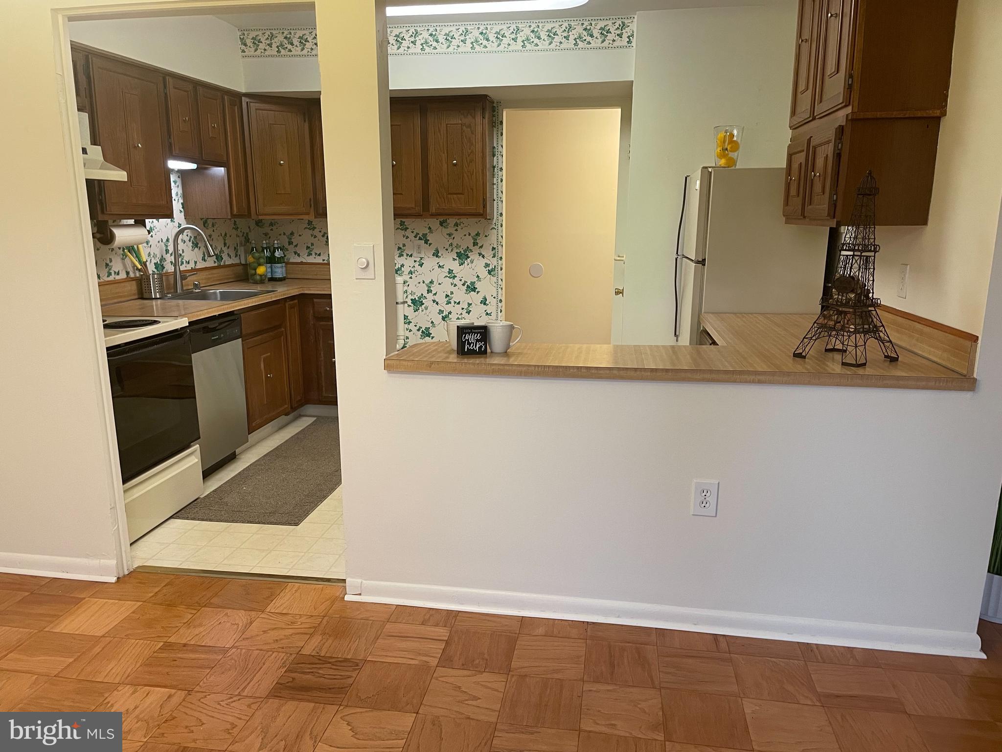 10053 Windstream Drive, Unit 3 Columbia, MD 21044 - Photo 18 of 57 a bathroom with a sink and a mirror