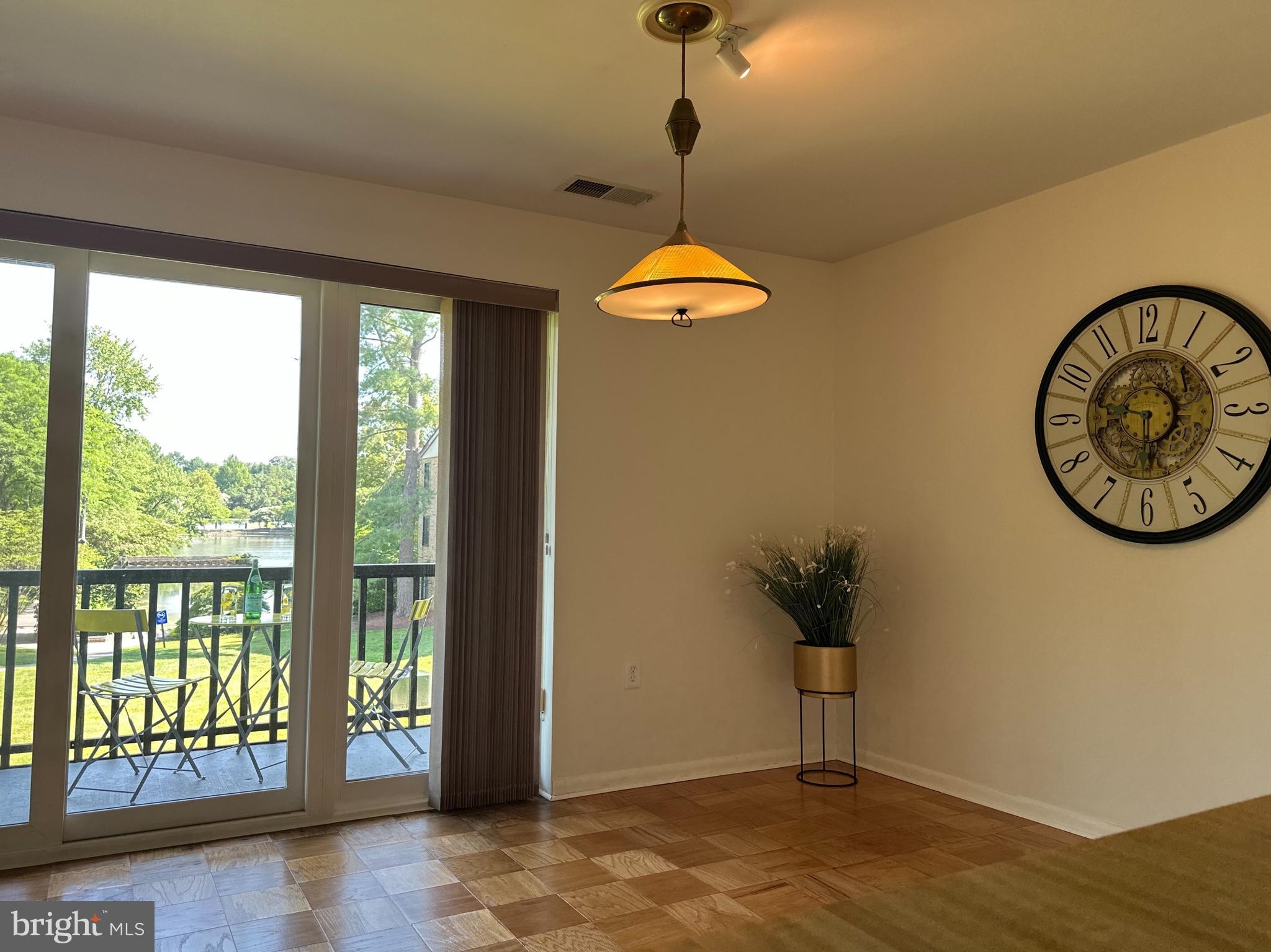 10053 Windstream Drive, Unit 3 Columbia, MD 21044 - Photo 21 of 57 a view of a hallway with windows
