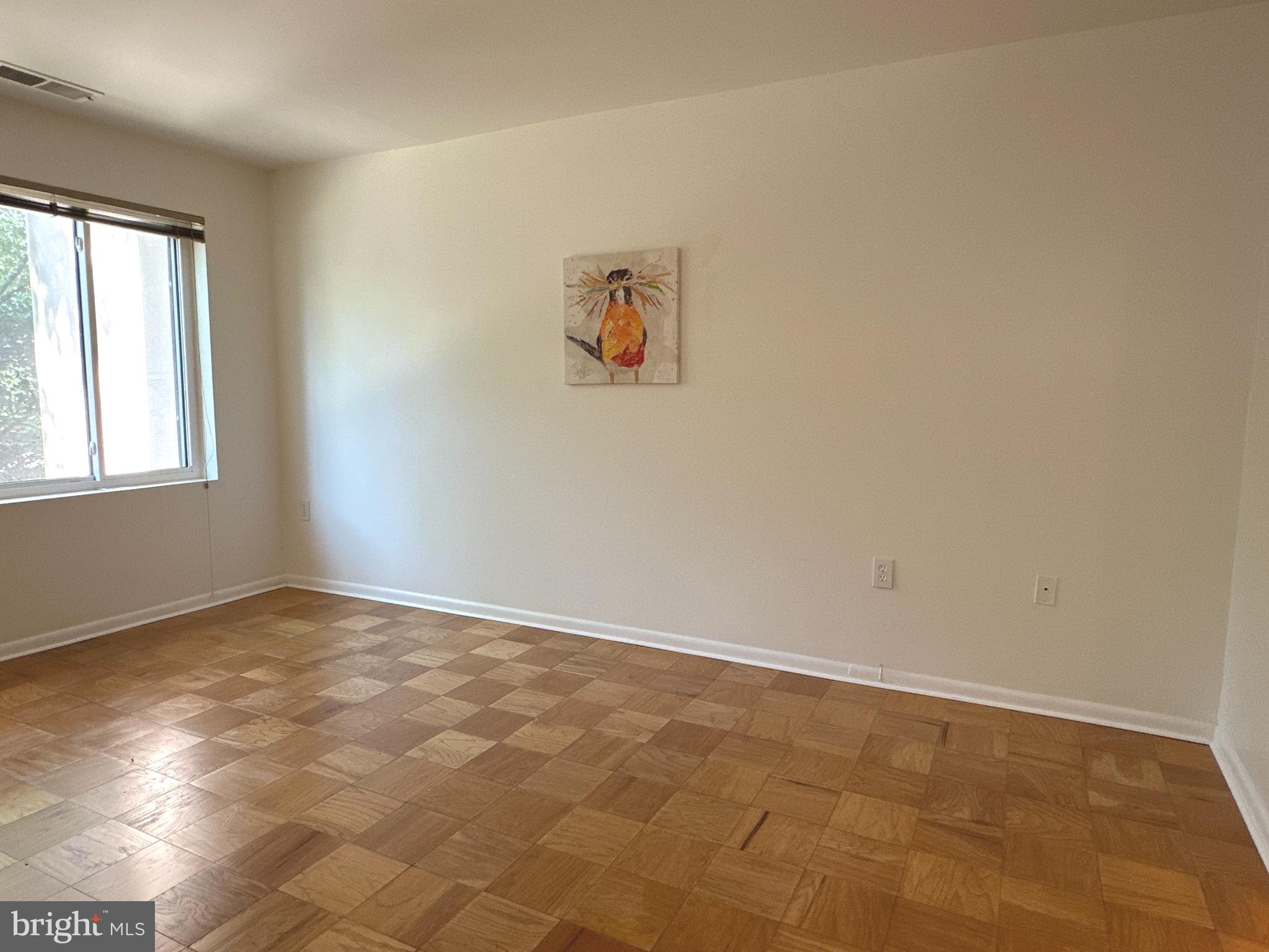 10053 Windstream Drive, Unit 3 Columbia, MD 21044 - Photo 25 of 57 an empty room with windows