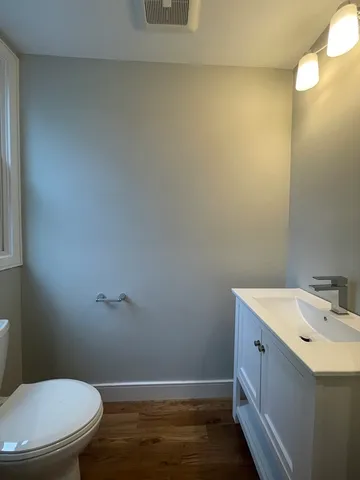 a bathroom with a sink and a toilet