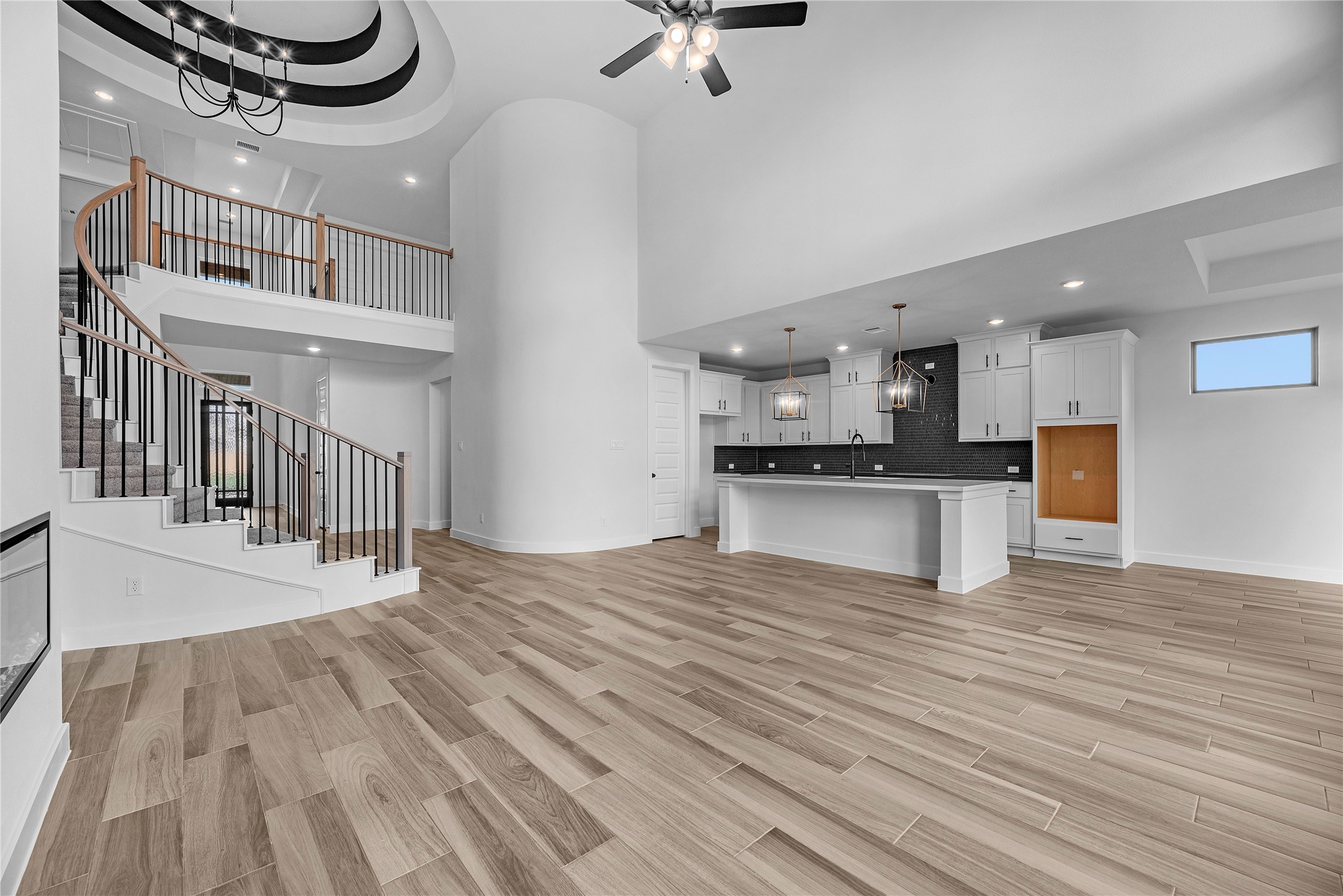 615 Roland Lane Rosenberg, TX 77471 - Photo 4 of 26 a view of kitchen and dining room with wooden floor