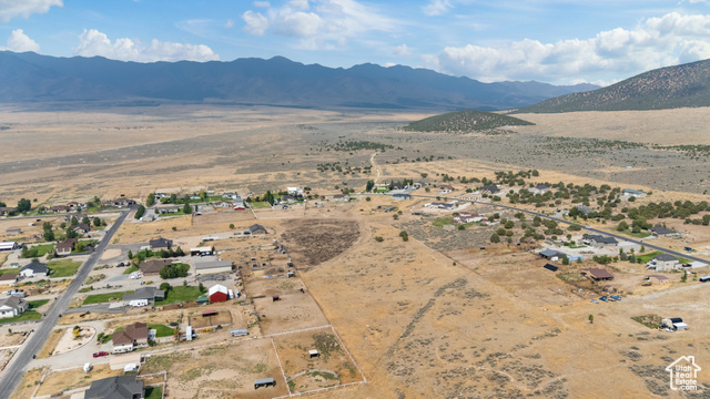 2974 West Ridgeline Road, Unit 85 Stockton, UT 84071 - Photo 20 of 23 Aerial view of property and surrounding area with a desert landscape and rural landscape