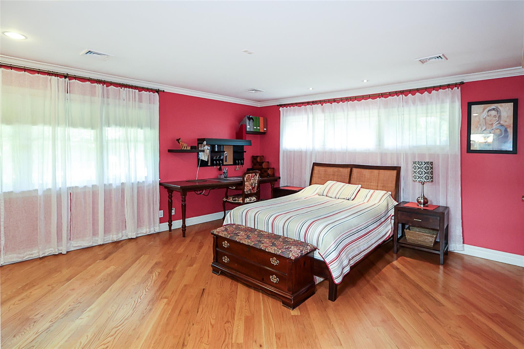 19 Marietta Road Glen Cove, NY 11542 - Photo 18 of 46 a bed sitting in a spacious bedroom next to a window