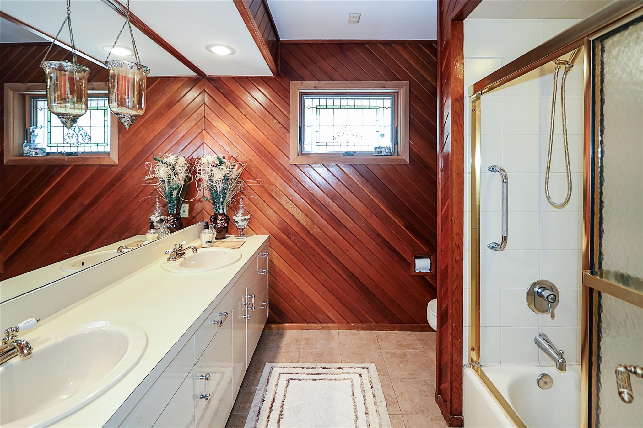 19 Marietta Road Glen Cove, NY 11542 - Photo 24 of 46 a bathroom with a sink and shower