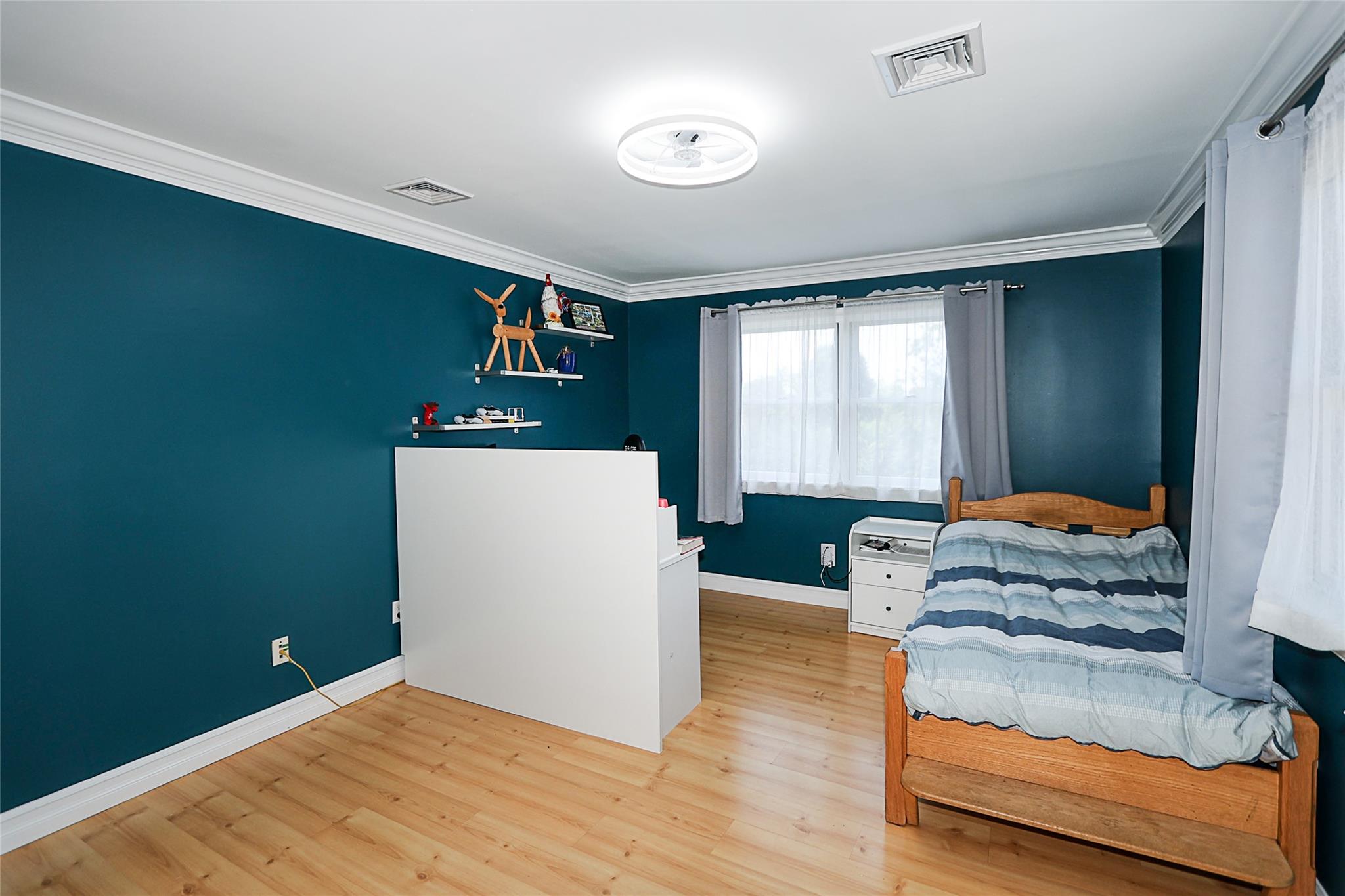 19 Marietta Road Glen Cove, NY 11542 - Photo 34 of 46 a living room with furniture and a large window