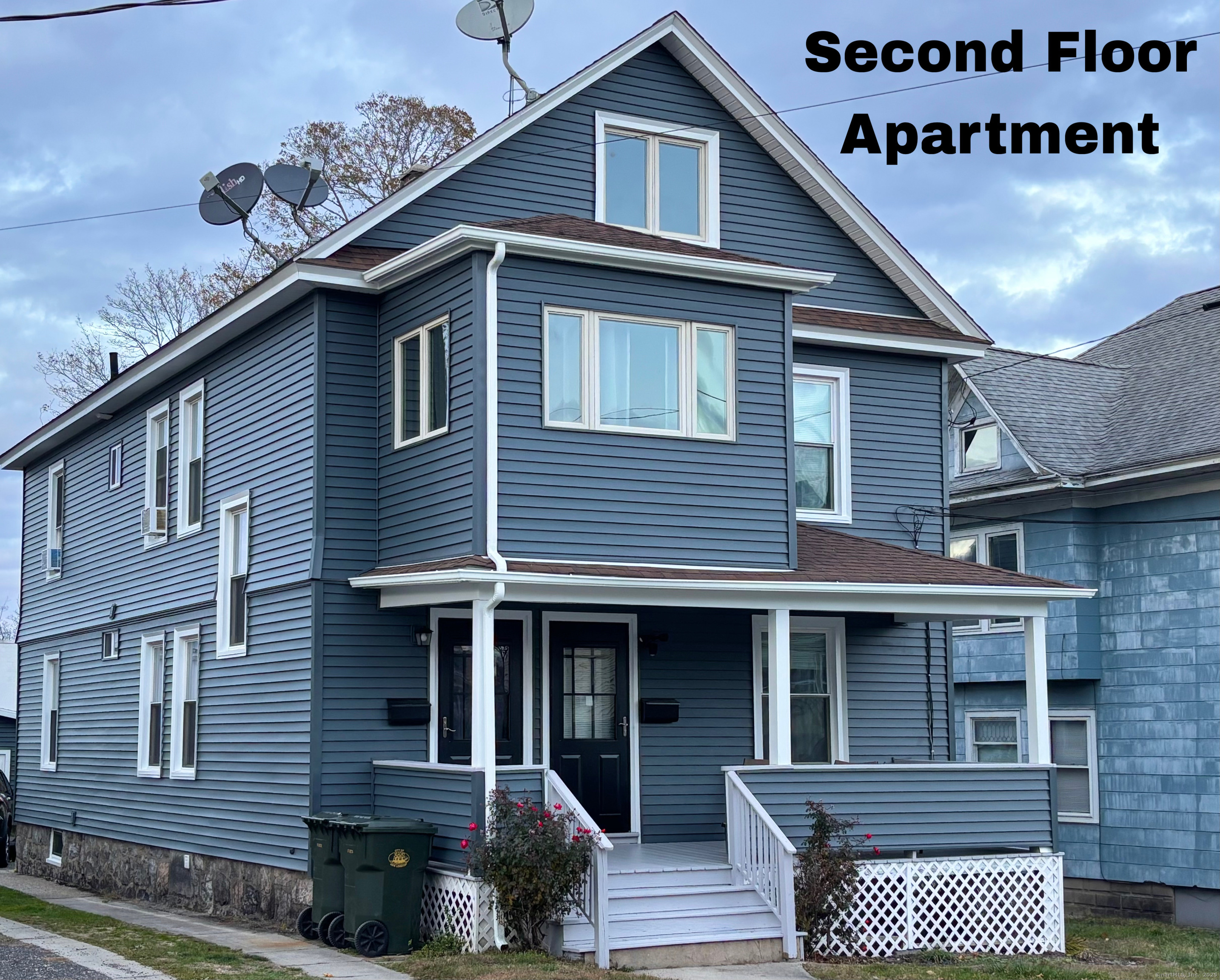 19 Darrow Street, Unit 2 New London, CT 06320 - Photo 1 of 1 a front view of a house with a balcony