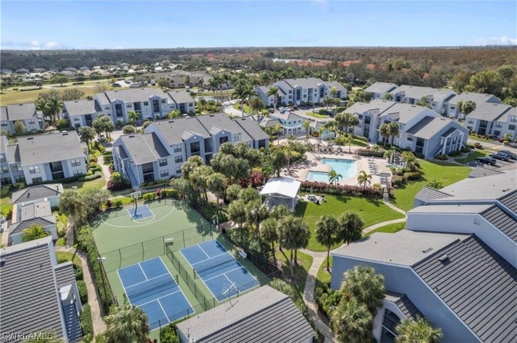 13571 Eagle Ridge Drive, Unit 1325 Fort Myers, FL 33912 - Photo 3 of 17 Aerial perspective of suburban area with a pool area