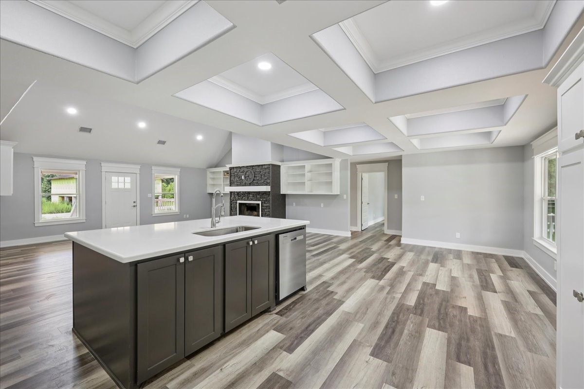 8679 Massey Lake Road Silsbee, TX 77656 - Photo 19 of 37 a kitchen with a sink stove and cabinets