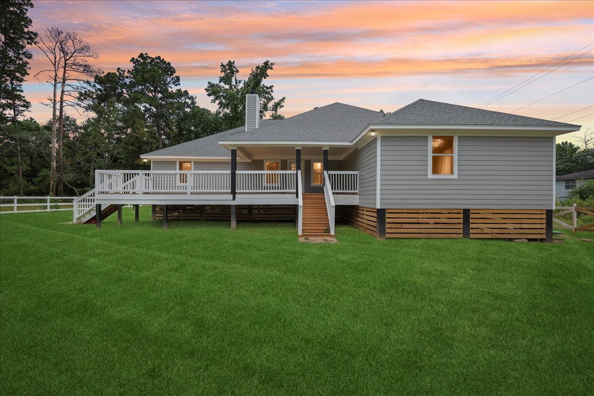 8679 Massey Lake Road Silsbee, TX 77656 - Photo 2 of 37 a view of a house with a backyard