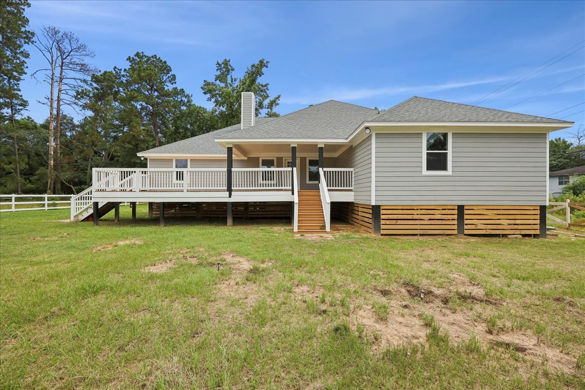 8679 Massey Lake Road Silsbee, TX 77656 - Photo 35 of 37 a view of a house with a backyard