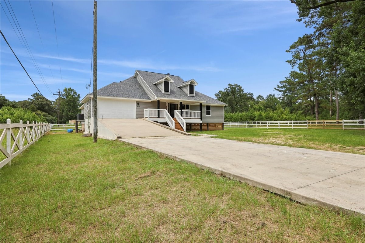 8679 Massey Lake Road Silsbee, TX 77656 - Photo 7 of 37 a house view with a outdoor space