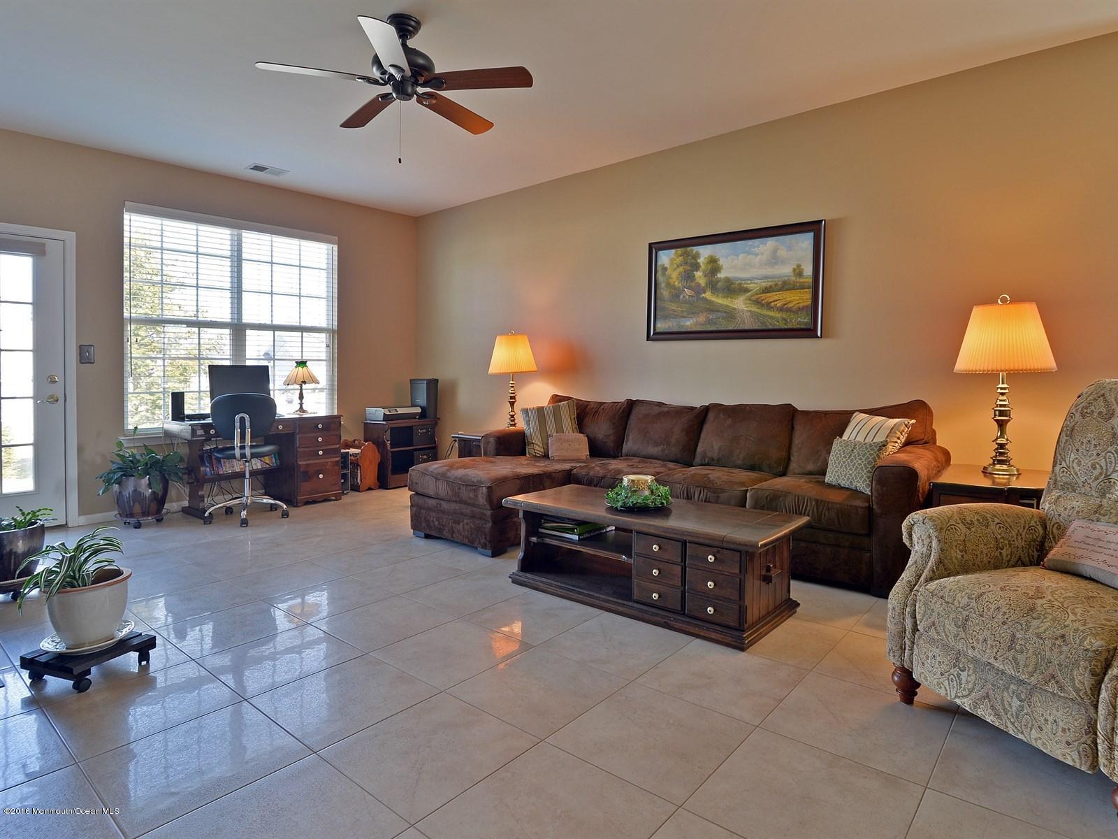 33 Criollo Road Manalapan, NJ 07726 - Photo 8 of 22 a living room with furniture and a window