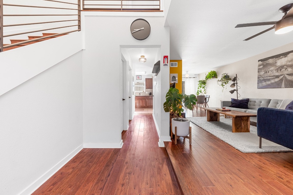 6211 Manor Road, Unit 109 Austin, TX 78723 - Photo 1 of 1 a view of a living room with furniture and wooden floor