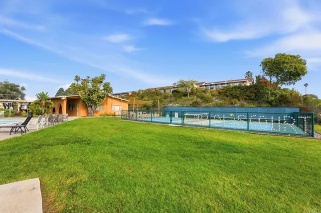 a view of a garden with an ocean