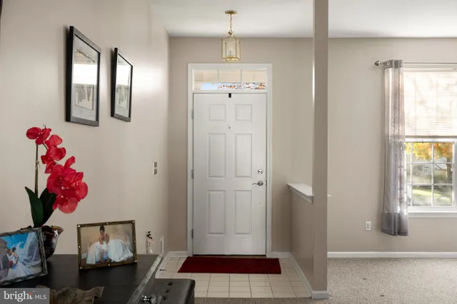 a bathroom with a mirror and a shower