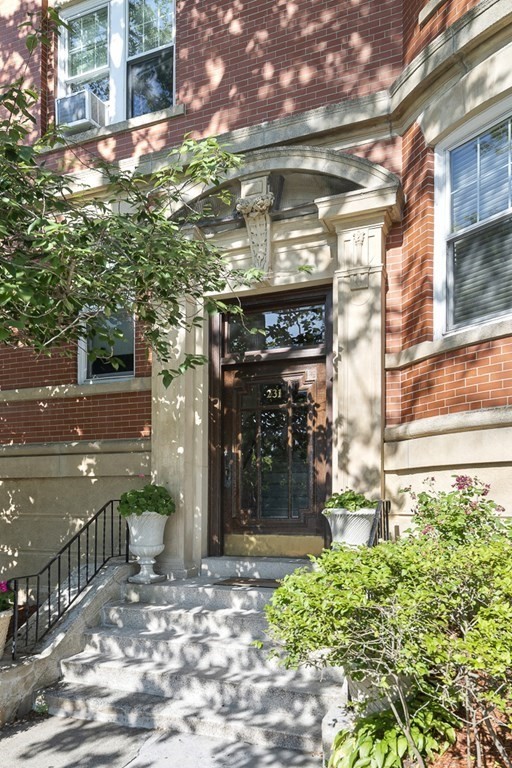 a view of a building with a tree