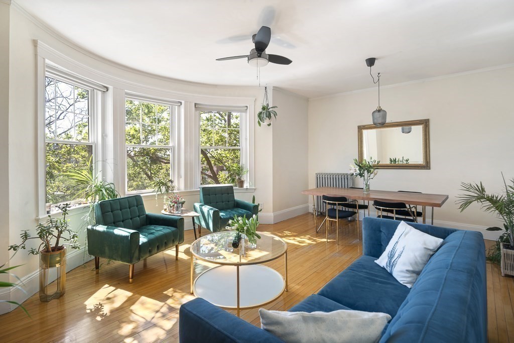 231 Rawson Road, Unit 6 Brookline, MA 02445 - Photo 4 of 11 a living room with furniture and window