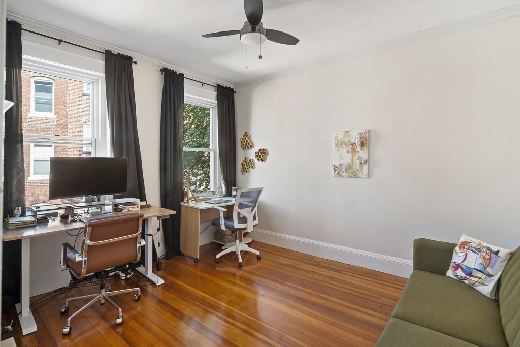 231 Rawson Road, Unit 6 Brookline, MA 02445 - Photo 9 of 11 a view of a workspace with furniture and a window
