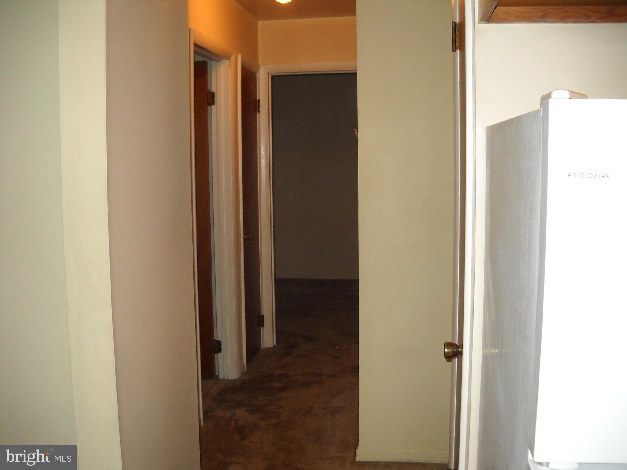 6215 Auth Road Suitland, MD 20746 - Photo 14 of 21 View down hallway from kitchen