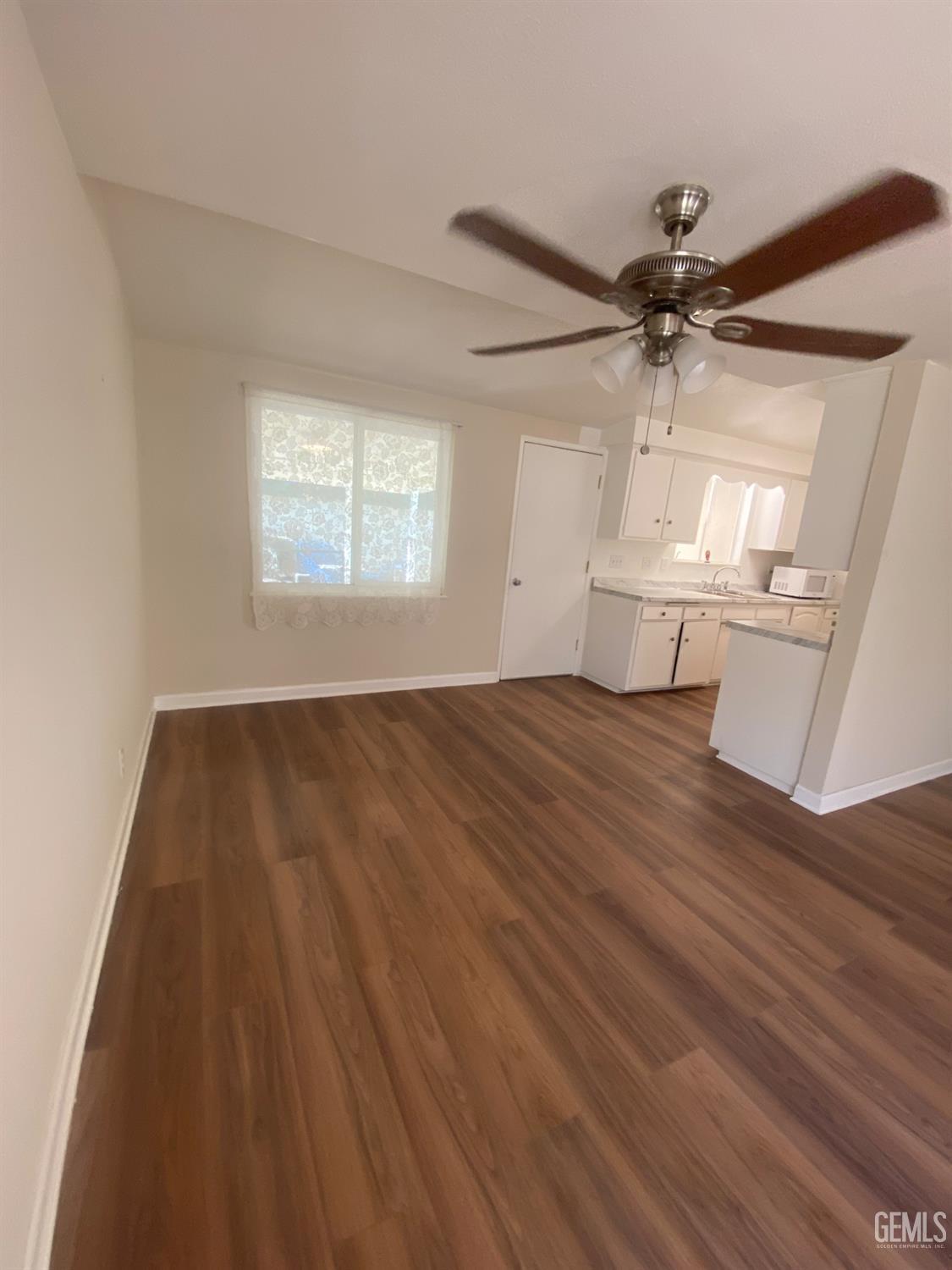 Undisclosed Address Santa Ana, CA 92707 - Photo 12 of 40 wooden floor in an empty room with a window