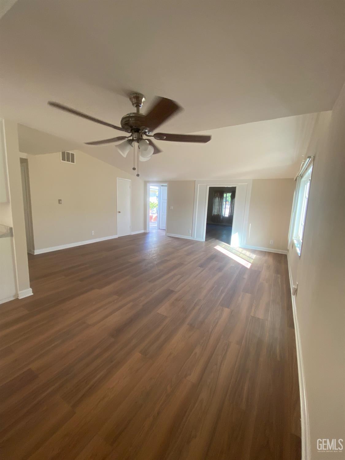 Undisclosed Address Santa Ana, CA 92707 - Photo 18 of 40 wooden floor in an empty room with a window