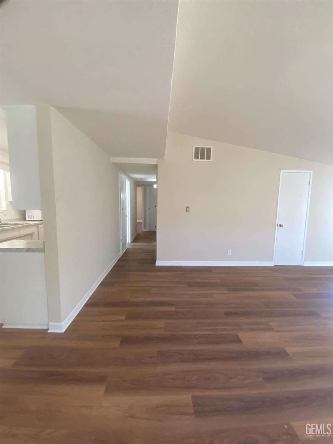 Undisclosed Address Santa Ana, CA 92707 - Photo 24 of 40 a view of a room with wooden floor