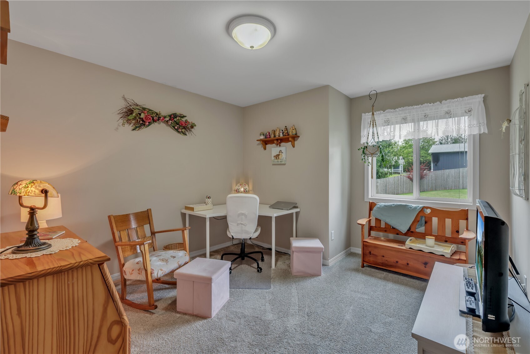 103 Southeast Alder Manor Road Shelton, WA 98584 - Photo 20 of 39 a living room with furniture and a flat screen tv