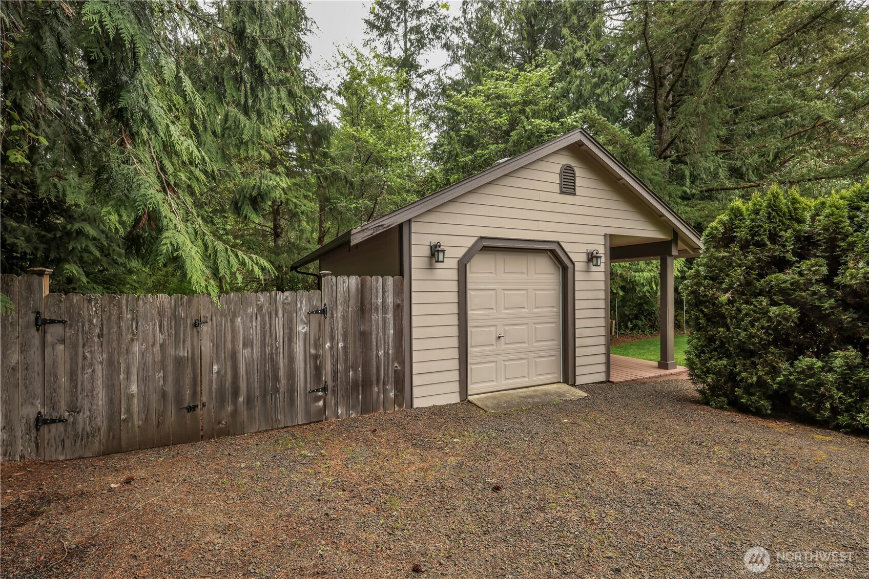 103 Southeast Alder Manor Road Shelton, WA 98584 - Photo 25 of 39 a view of a house with a yard and large tree